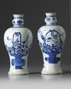 A pair of Chinese blue and white 'flower basket' vases