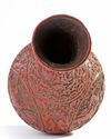 A Chinese carved cinnabar lacquer slender vase