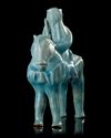 A RARE KASHAN TURQUOISE-GLAZED FIGURE OF A MONGOL, PERSIA, 13TH CENTURY