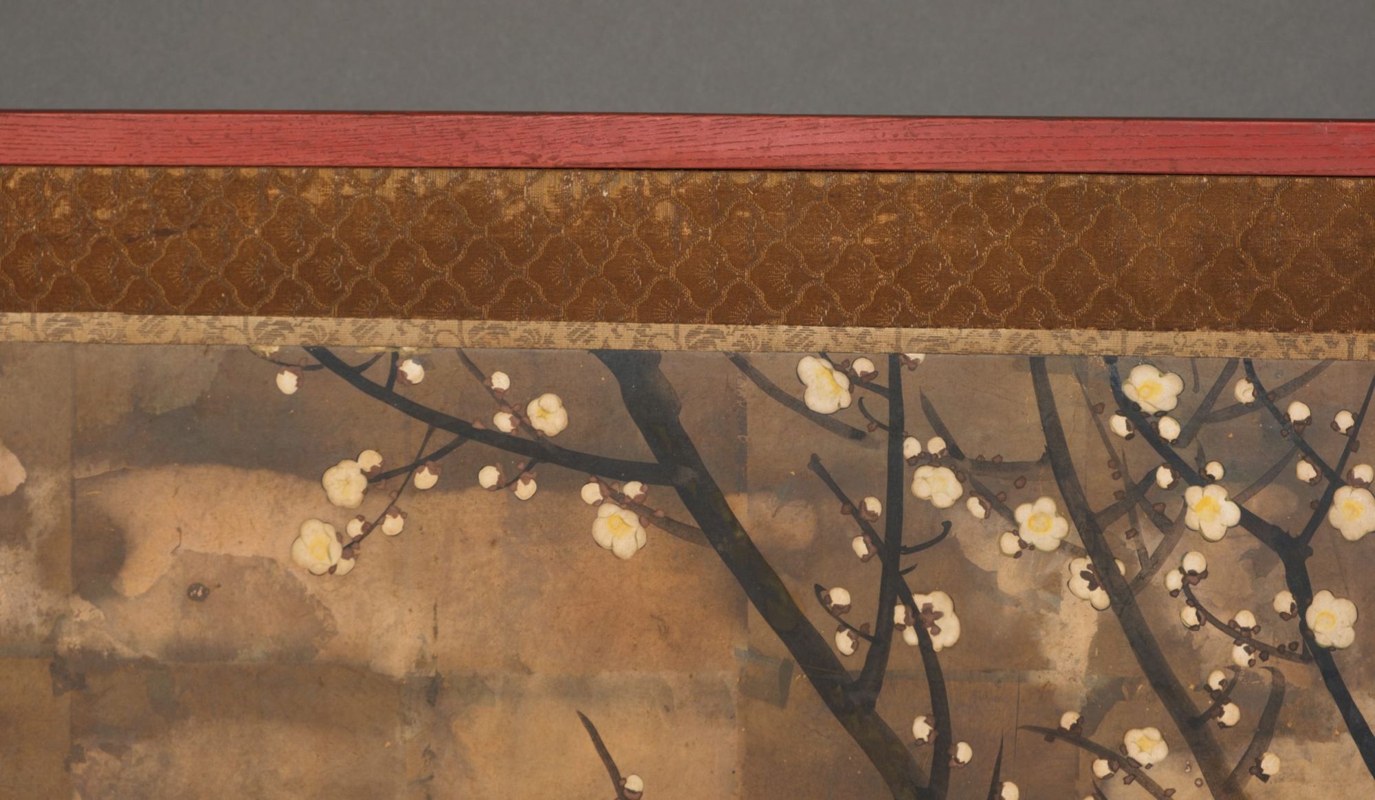 A JAPANESE SCREEN ON OXIDIZED SILVER LEAF PRESENTING A SPRING