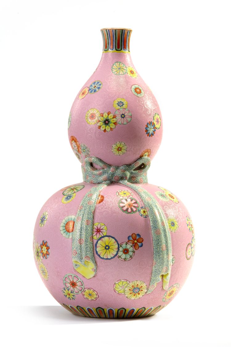 A Chinese pink-ground sgraffiato flower roundel double gourd 'trompe l'oeil' vase