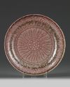 A Chinese peach-bloom glazed 'lotus' dish