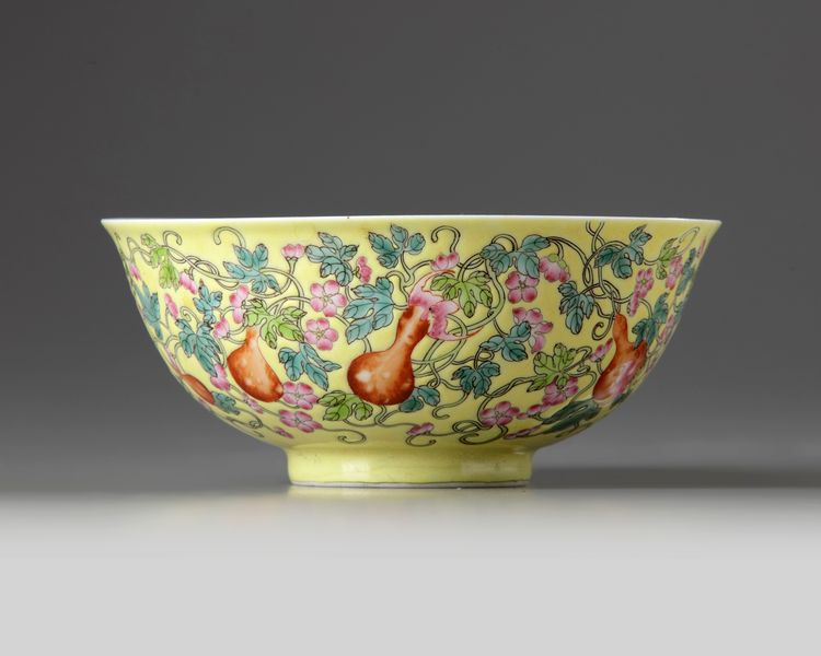 A Chinese yellow-ground famille rose 'gourds' bowl