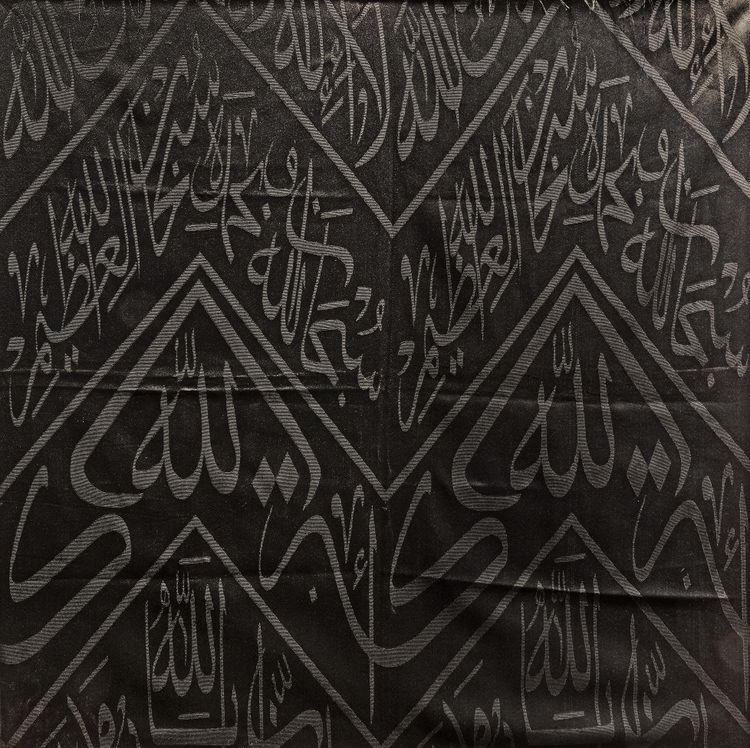 A BLACK KAABA KISWAH TEXTILE FRAGMENT, CIRCA 1930