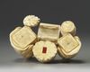 A Japanese Carved ivory okimono group