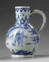 A JAPANESE BLUE AND WHITE JUG, 17TH CENTURY