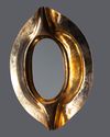 An Ottoman gilt metal frame of the black stone AL-hajaru al Aswad