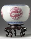 A pair of Chinese famille rose 'dragon' jardinieres