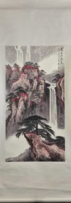 A Chinese hanging scroll of a mountain landscape