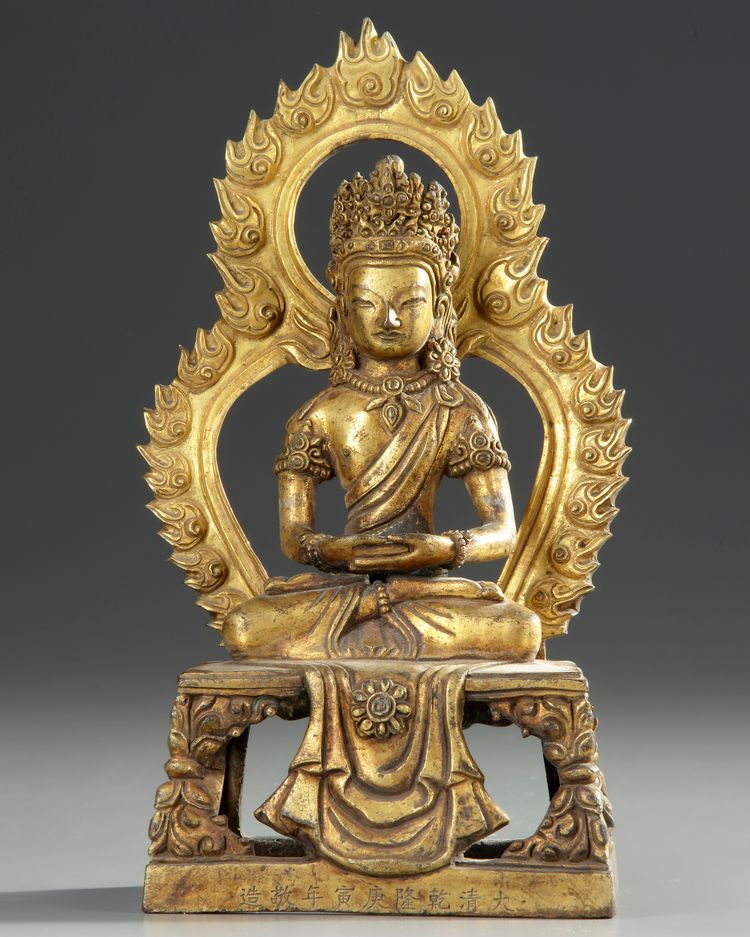 A CHINESE GILT BRONZE SEATED FIGURE OF BUDDHA AMITAYUS