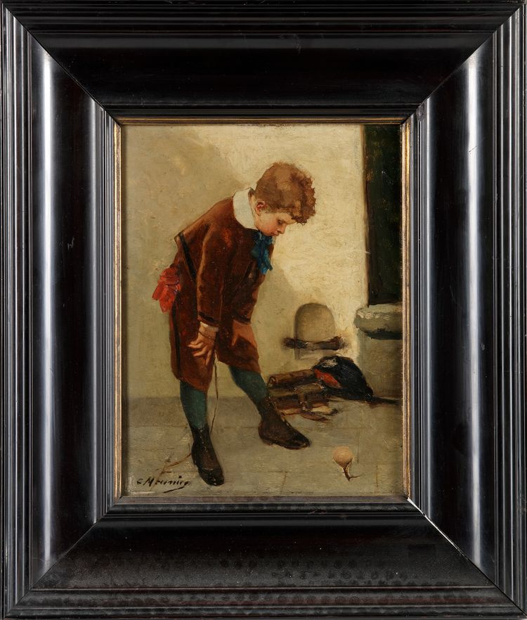 BOY PLAYING WITH SPINNING TOP