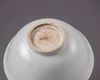 A Chinese Shufu-style white-glazed moulded 'dragon' bowl