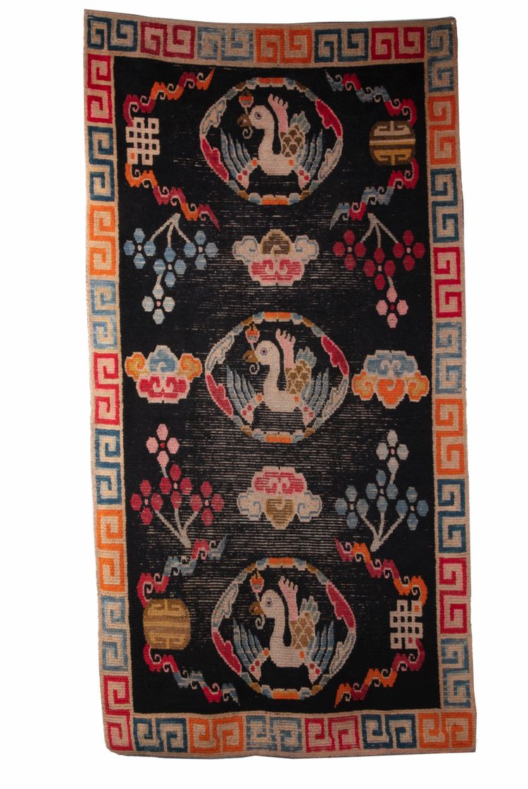 A TIBETAN WOOL CRANES RUG, TIBET, 20TH CENTURY FIRST QUARTER