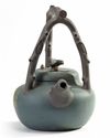 A MASSIVE CHINESE GREEN CLAY TEAPOT, 19TH-20TH CENTURY