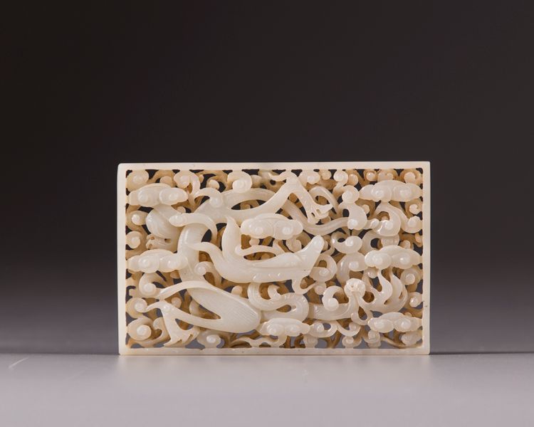 A white jade openwork ‘dragon’ plaque