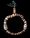 A TIBETAN AGATE BEADED BRACELET, 20TH CENTURY