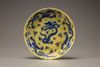 A yellow-ground blue and white 'dragon' dish