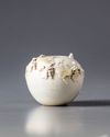 A CHINESE WHITE-GLAZED 'SQUIRREL AND GRAPES' WATER POT
