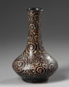 A Chinese Jizhou-style black-glazed 'guri' bottle vase