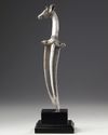 A MUGHAL METAL DEER HILTED DAGGER