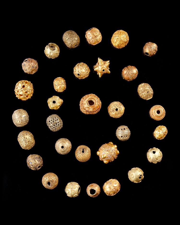 A FATIMID COLLECTION OF ORNATE GOLD BEADS, 11TH-13TH CENTURY