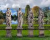 A SET OF FOUR SCULPTED LIMESTONE MODELS OF MAIDENS REPRESENTING THE FOUR SEASONS, LATE 19TH CENTURY