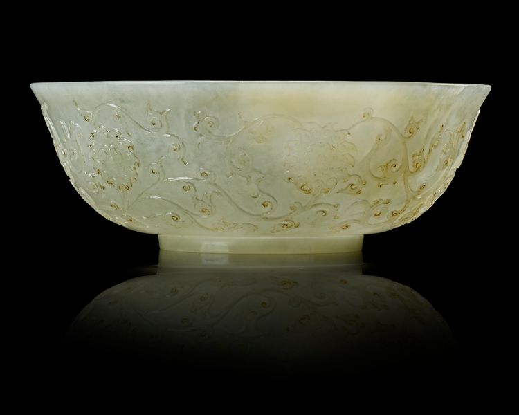 A CHINESE CARVED JADE BOWL, 18TH CENTURY