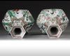 A pair of Chinese famille verte hexagonal bottle vases