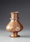 BRASS VASE WITH INSCRIPTION BANDS AND ARABESQUES, MID 14TH CENTURY