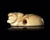 A JEMDET NASR SEAL IN THE FORM OF A RECLINING RABBIT, 3RD MILLENIUM BC
