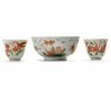 A Chinese famille verte 'goldfish' bowl and a pair of 'goldfish' cups