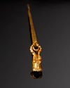 A ROMAN GOLD PIN WITH HEAD OF IBEX AND GARNET, CIRCA 3RD-4TH CENTURY A.D.