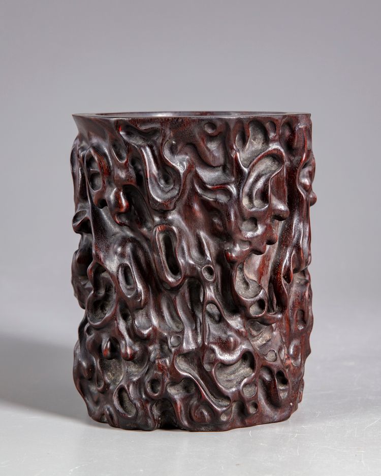 A Chinese wooden brush pot