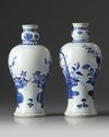 A pair of Chinese blue and white 'flower basket' vases