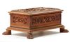 A DEEPLY CARVED SANDALWOOD CHEST WITH HUNTING SCENES