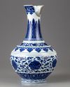 A blue and white bottle vase