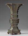A Chinese archaistic bronze square section vase, fanggu