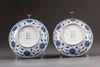 A pair of Chinese blue and white 'lotus' dishes