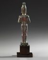 AN EGYPTIAN BRONZE OSIRIS STATUE, 26TH DYNASTY, CIRCA 664–525 B.C.