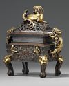 A Chinese parcel gilt twin 'qilin' handled rectangular censer and cover