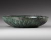 AN ACHAEMENID BRONZE DECORATED PHIALE, CIRCA 6TH-4TH CENTURY B.C.