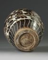A Chinese Cizhou-style carved meiping