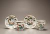 Two pairs of famille rose 'deer and lingzhi' cups and saucers