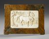 A CARVED BONE RELIEF PANEL, 20TH CENTURY