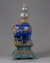 A lapis lazuli carving of a elephant with cloisonné mounts and stand