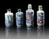 A GROUP OF FOUR CHINESE BLUE AND WHITE 'FIGURAL' SNUFF BOTTLES