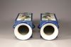 A pair of powder-blue-ground famille verte square-section vases, cong