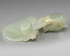 A CHINESE PALE CELADON JADE 'DRAGON' BELT HOOK, QING DYNASTY, 19TH CENTURY