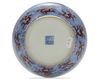 A CHINESE IRON-RED-DECORATED BLUE AND WHITE DRAGON DISH, 19TH CENTURY