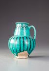 UNDERGLAZE PAINTED POTTERY EWER , 12TH–13TH CENTURY